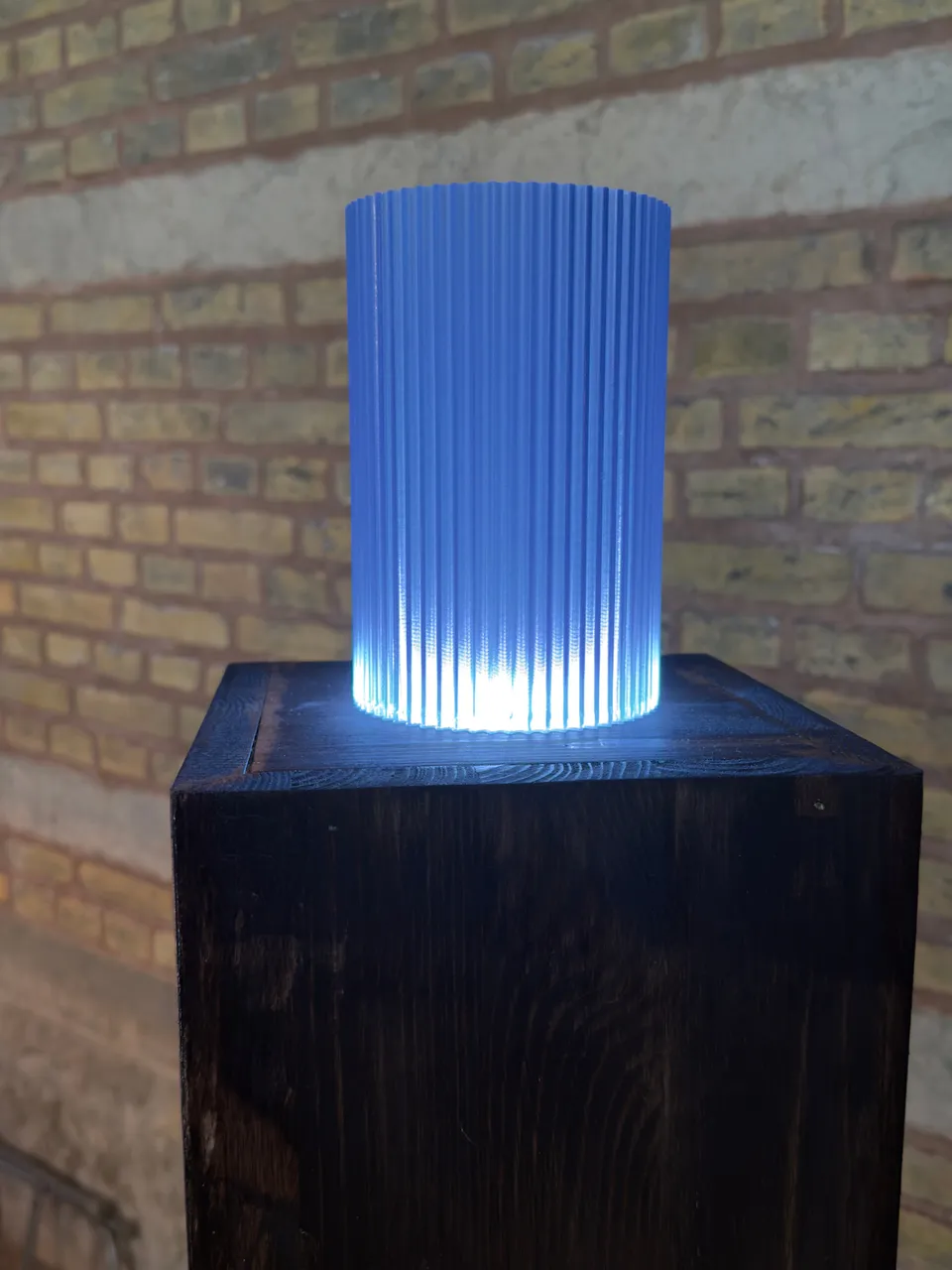 The Samarel Freestanding light in Sky, the ridges carrying the light upward