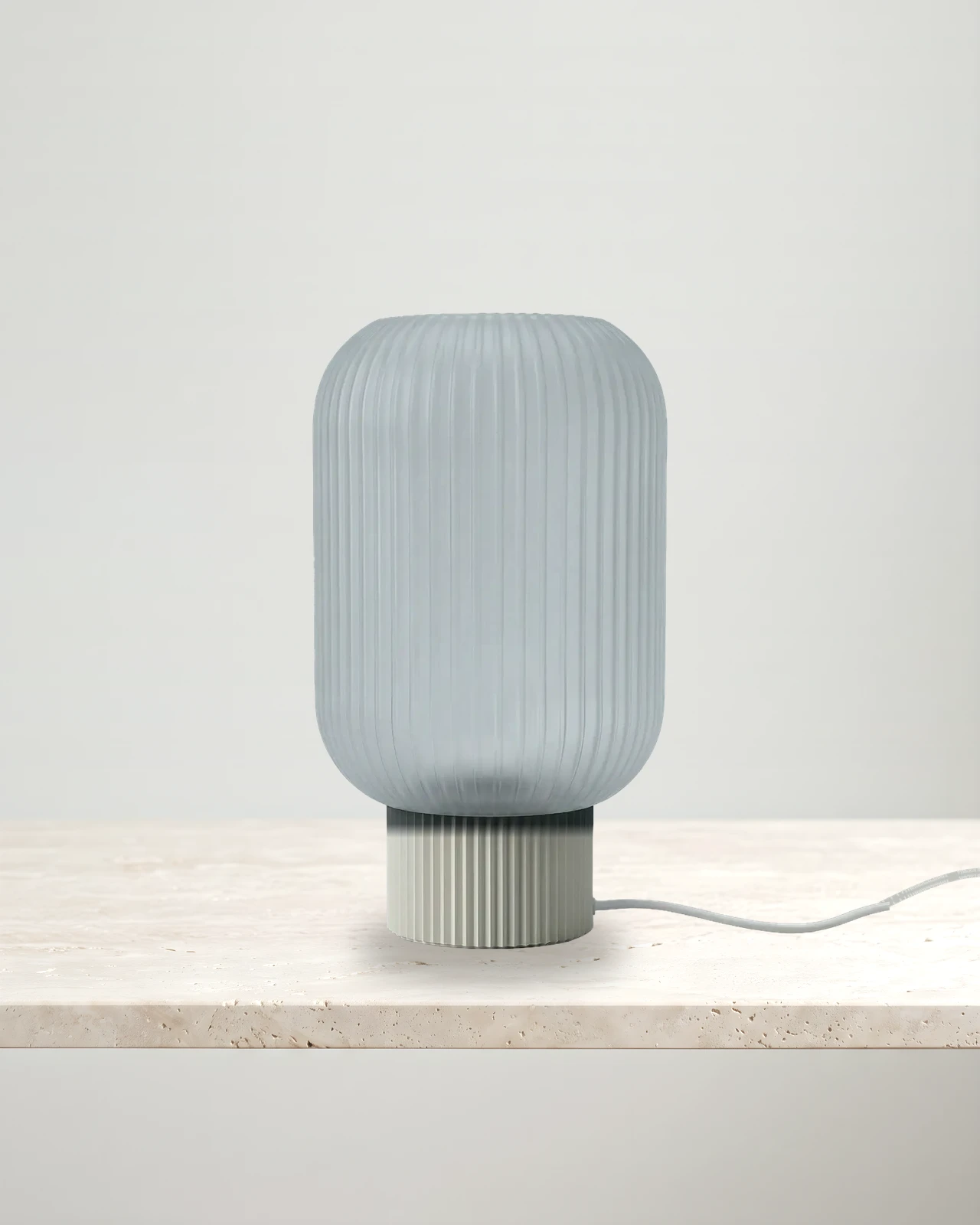 Noorian table lamp with clear shade and chalk base, light unlit
